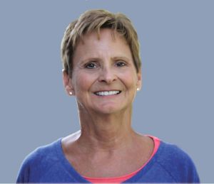 Kathryn Taylor headshot-grey background_preview